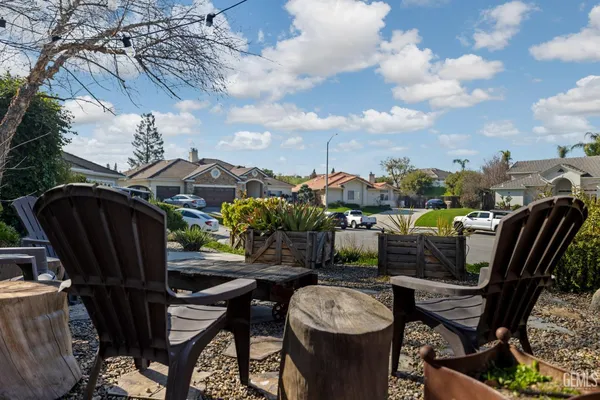 a view of a dinning tables and chairs in the patio
