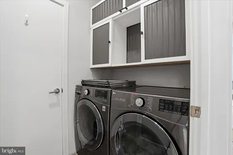 a view of washer and dryer in a utility room