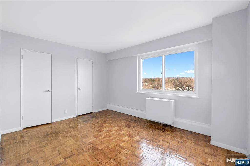 377 South Harrison Street, Unit 9G East Orange, NJ 07018 - Photo 10 of 27 a view of an empty room and window