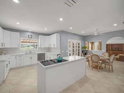 a bathroom with a toilet a sink and a mirror