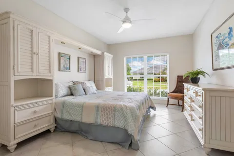 an aerial view of residential houses with outdoor space and street view