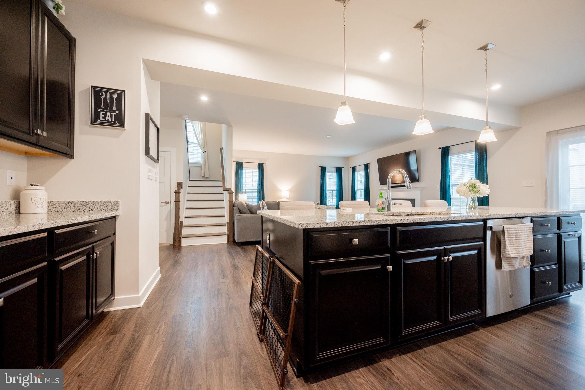 772 Wallasey Drive Middletown, DE 19709 - Photo 29 of 60 a kitchen with a sink and wooden floor