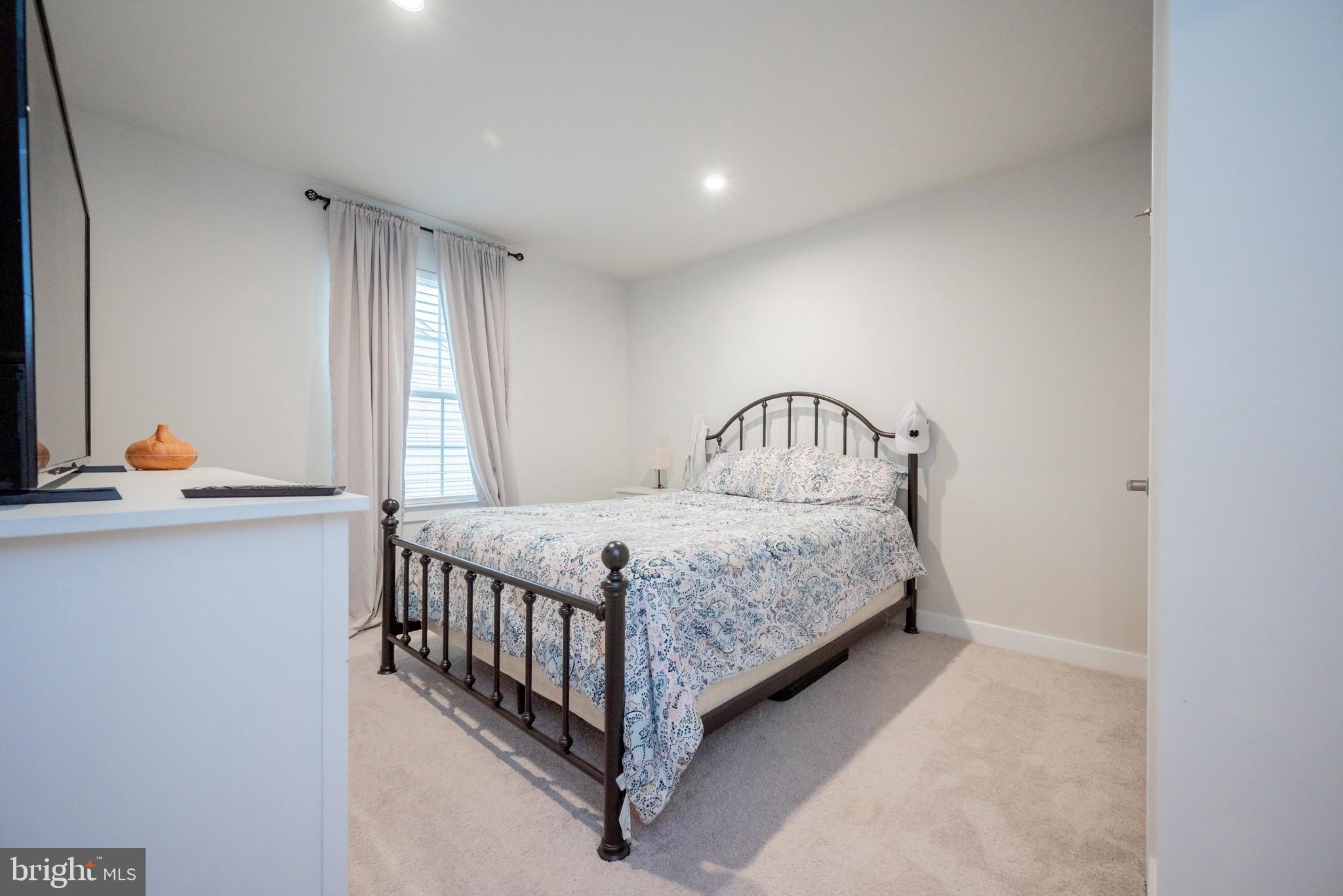 772 Wallasey Drive Middletown, DE 19709 - Photo 31 of 60 a bedroom with a bed and window