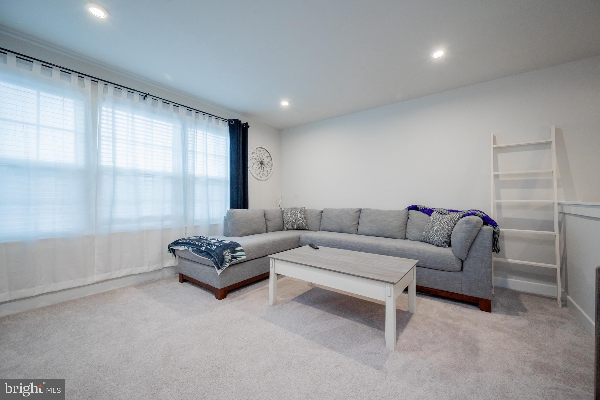772 Wallasey Drive Middletown, DE 19709 - Photo 39 of 60 a living room with furniture and a window