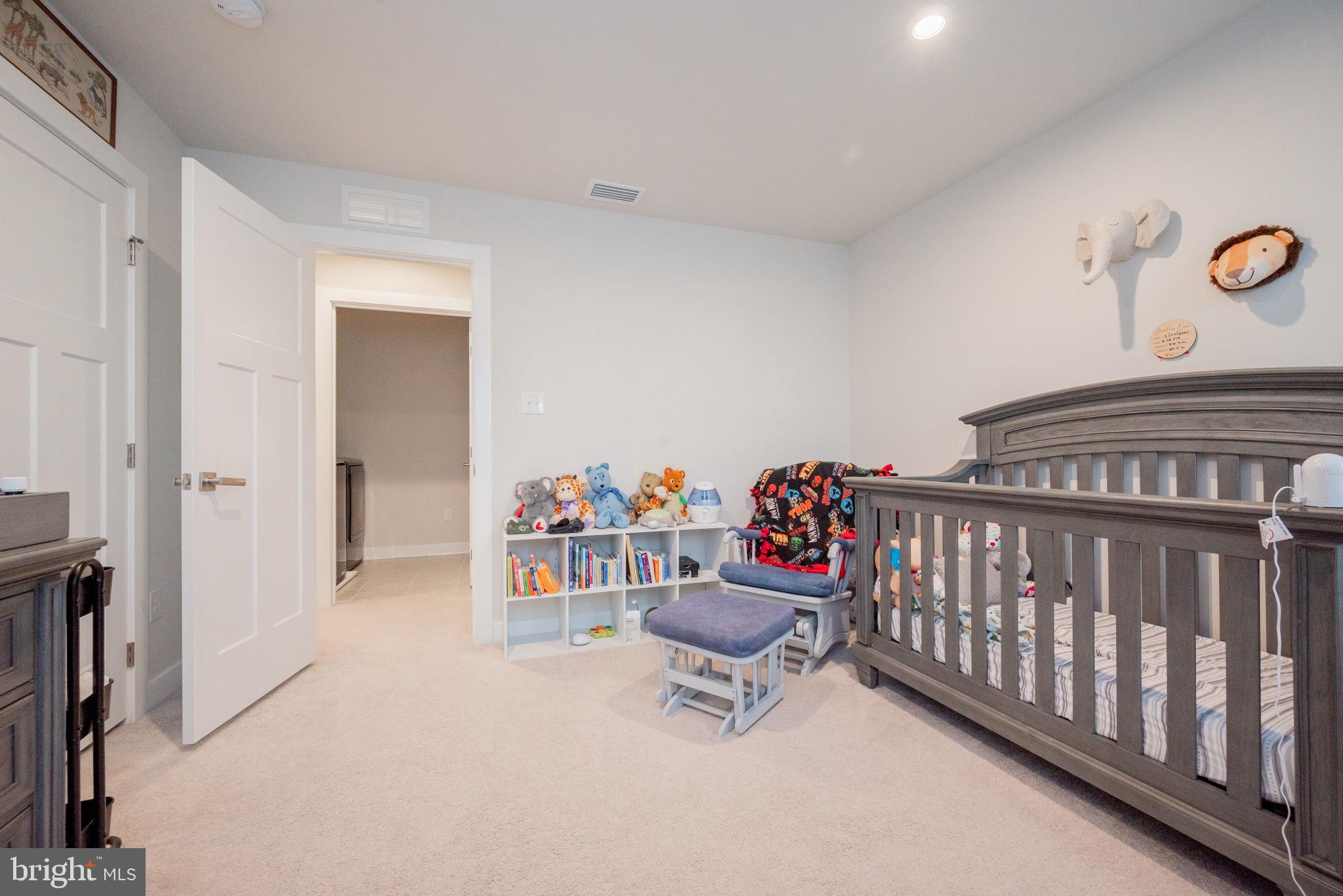 772 Wallasey Drive Middletown, DE 19709 - Photo 45 of 60 a bedroom with furniture and a rug