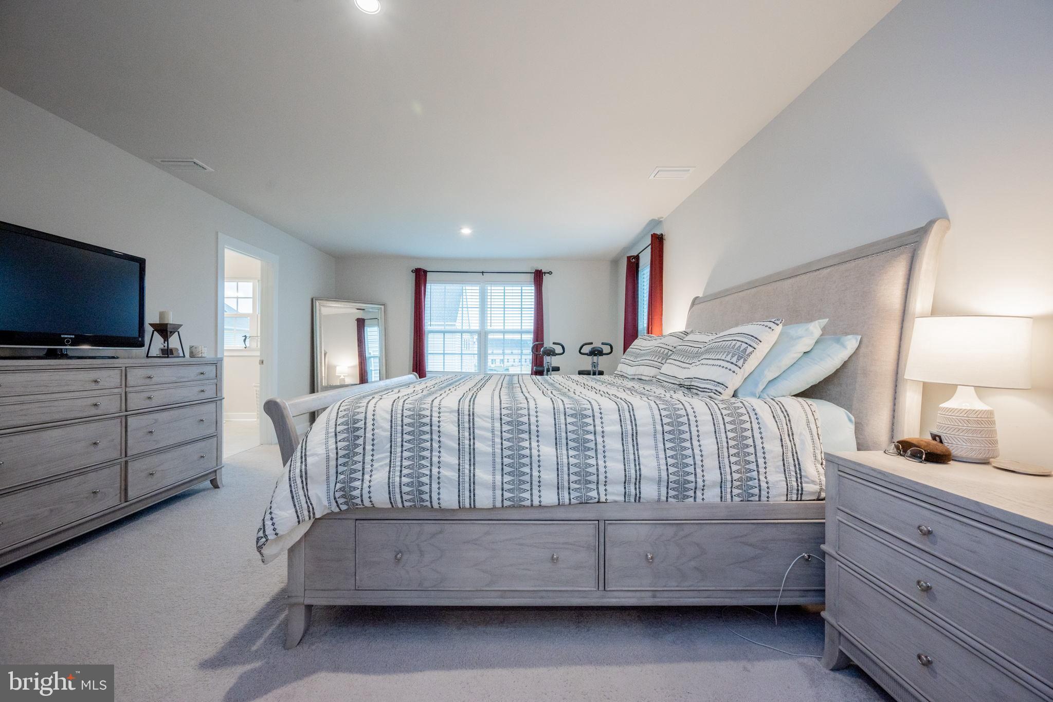 772 Wallasey Drive Middletown, DE 19709 - Photo 48 of 60 a living room with furniture and a flat screen tv