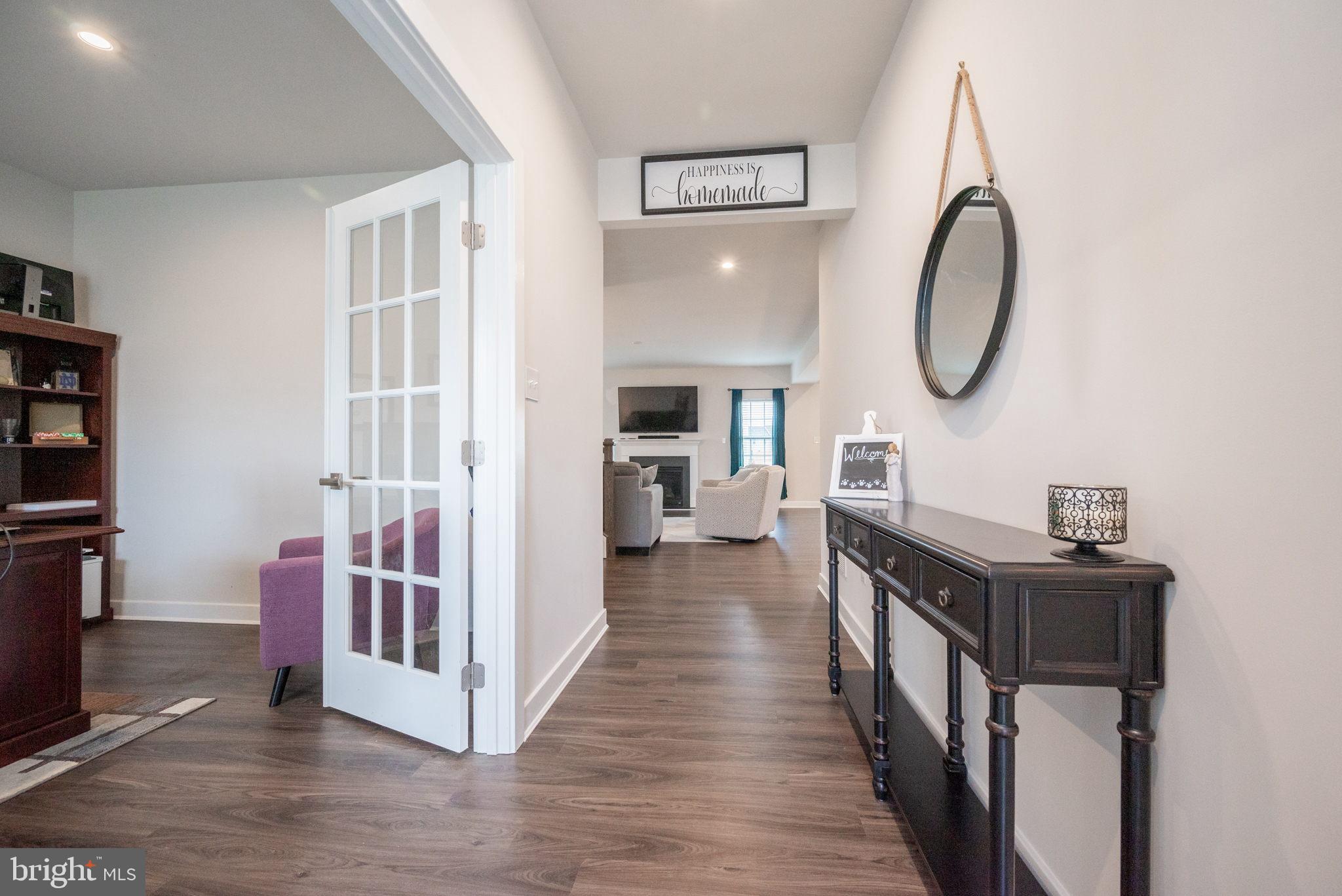 772 Wallasey Drive Middletown, DE 19709 - Photo 8 of 60 a view of a livingroom with furniture and staircase