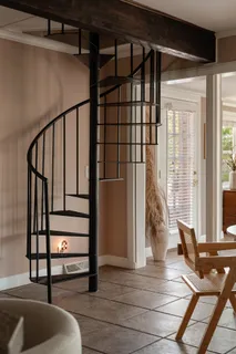 a view of workspace with wooden floor windows