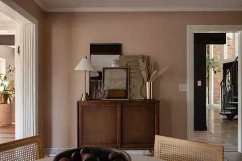 a bedroom with bed and window