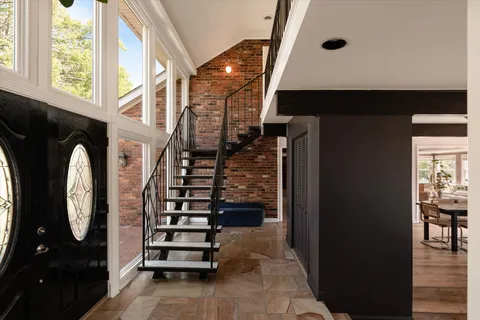 a view of entryway with a front door