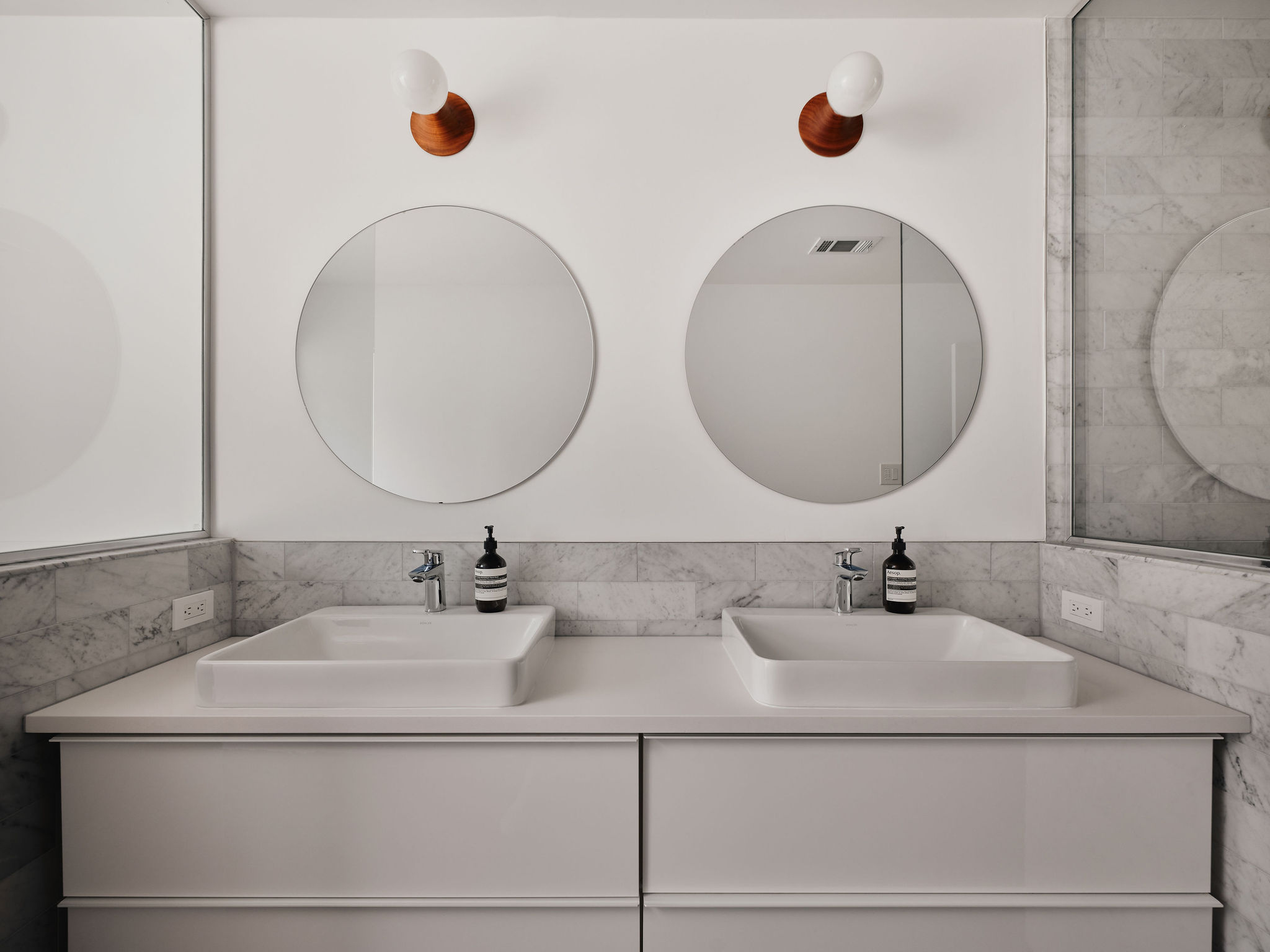 Undisclosed Address Austin, TX 78731 - Photo 15 of 26 Dual vanity with integrated sinks and minimalist design creates a clean, functional space.