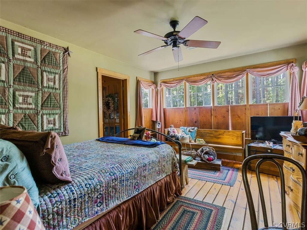 2430 Academy Road Powhatan, VA 23139 - Photo 23 of 43 1st floor owners suite with ceiling fan, wall of w
