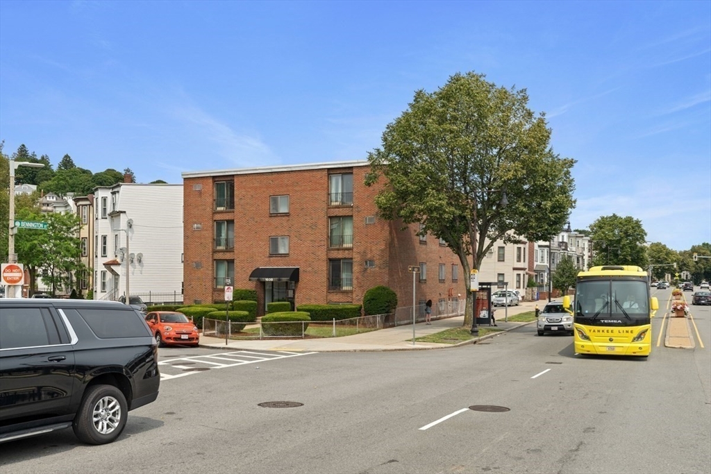 1030 Bennington Street, Unit 15 Boston, MA 02128 - Photo 20 of 20 a view of a cars parked in front of a house