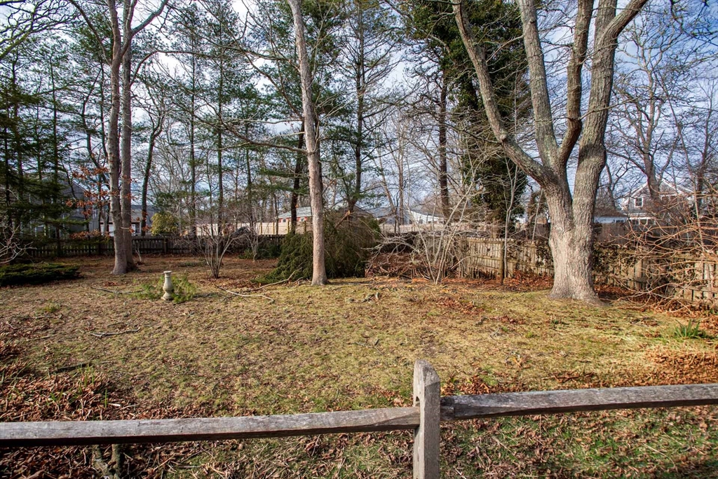 17 Chapman Lane Edgartown, MA 02539 - Photo 25 of 26 a view of a yard covered with snow in the front