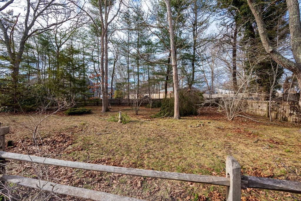 17 Chapman Lane Edgartown, MA 02539 - Photo 3 of 26 a backyard of a house with lots of green space