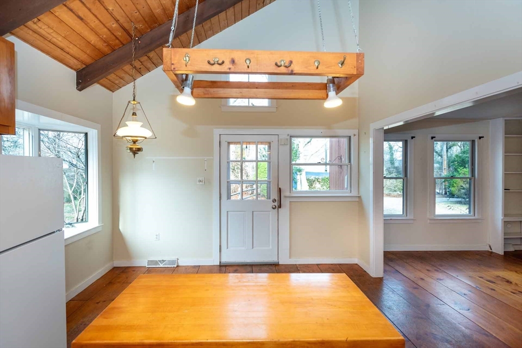 17 Chapman Lane Edgartown, MA 02539 - Photo 10 of 26 a view of room with window and wooden floor