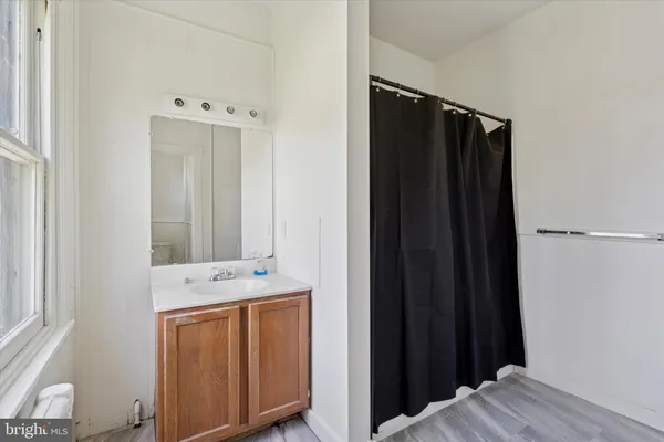 a view of a kitchen with a sink