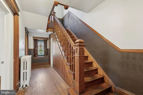 a view of entryway with a front door