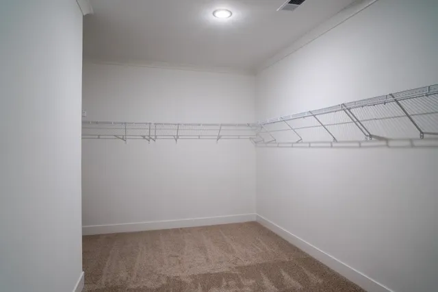a view of a room with racks on the wall