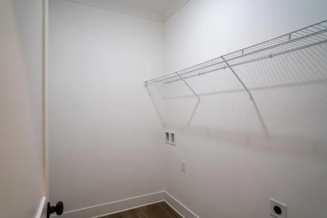 a view of a room with racks on the wall