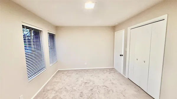 a view of a room with a window