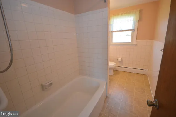 a bathroom with a bathtub