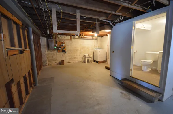 a view of storage and utility room