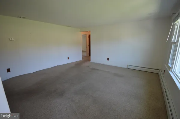 an empty room with a window