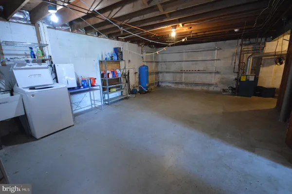 a view of storage and utility room