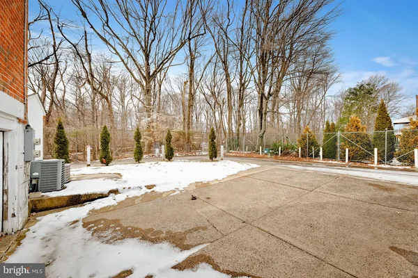 a view of a snow on the side of the road