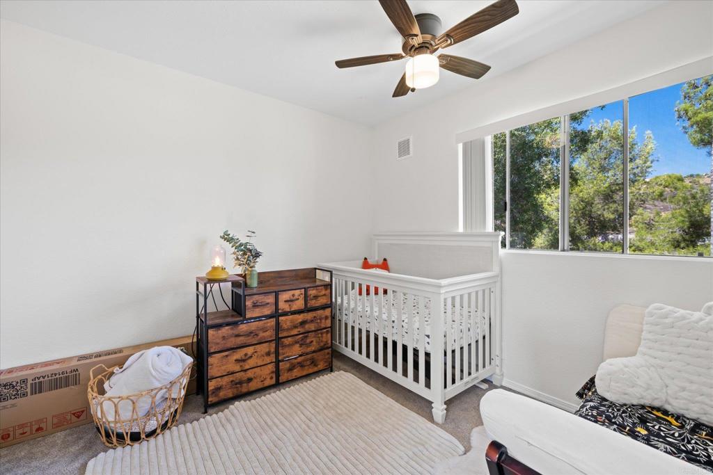8166 Lemon Grove Way, Unit B Lemon Grove, CA 91945 - Photo 19 of 38 a bedroom with furniture and a window