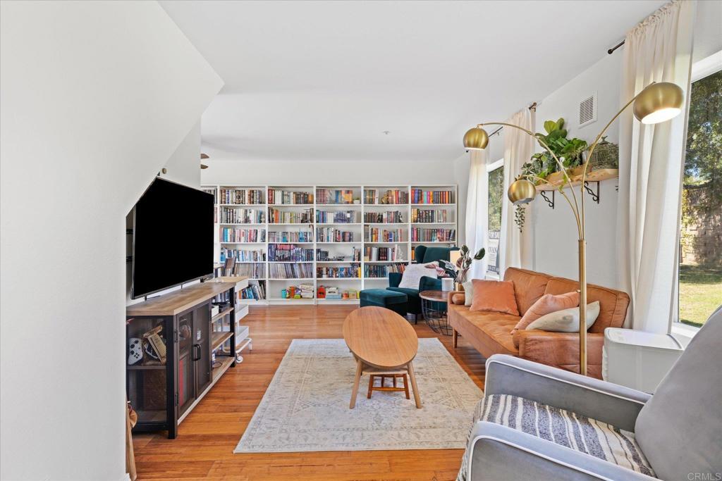 8166 Lemon Grove Way, Unit B Lemon Grove, CA 91945 - Photo 2 of 38 a living room with furniture and a flat screen tv