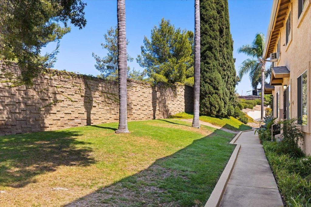 8166 Lemon Grove Way, Unit B Lemon Grove, CA 91945 - Photo 24 of 38 a view of a yard with plants