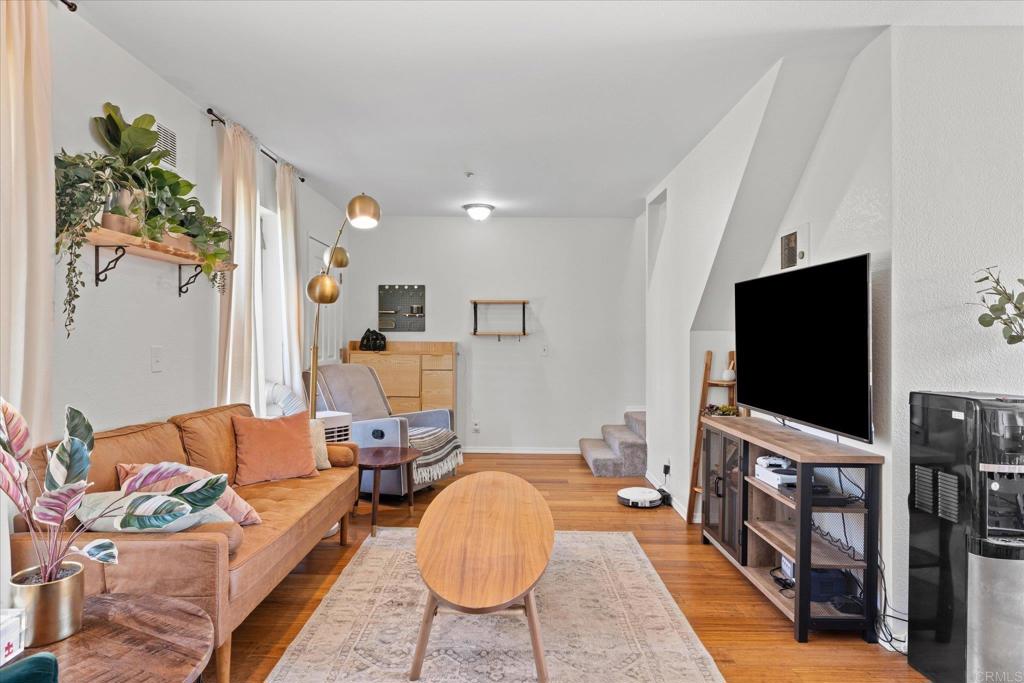 8166 Lemon Grove Way, Unit B Lemon Grove, CA 91945 - Photo 3 of 38 a living room with furniture and a flat screen tv