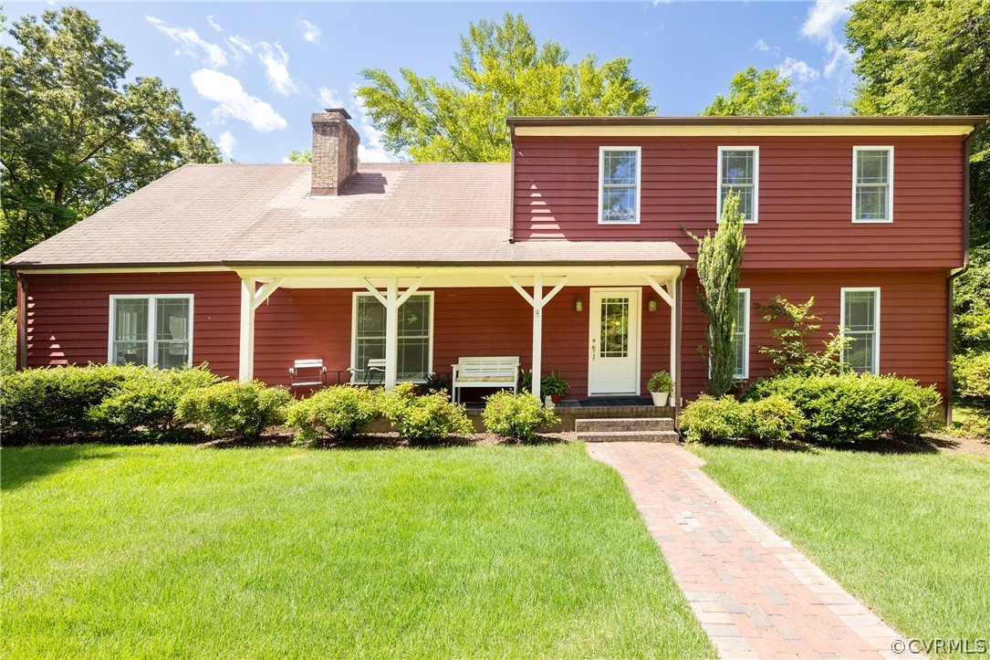 5421 Hunters Trail Road Goochland, VA 23063 - Photo 1 of 50 a front view of a house with a yard and porch