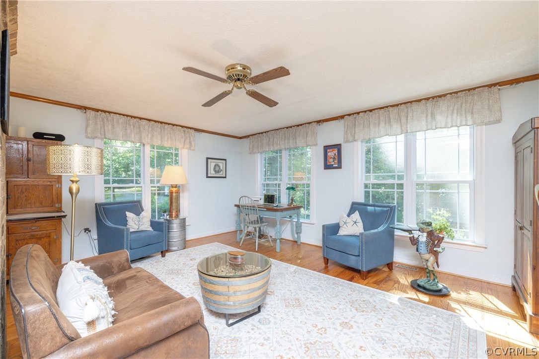 5421 Hunters Trail Road Goochland, VA 23063 - Photo 12 of 50 a living room with furniture and a large window