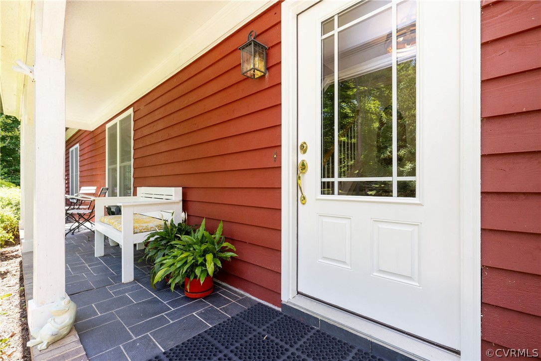 5421 Hunters Trail Road Goochland, VA 23063 - Photo 2 of 50 a view of front door of house with potted plant