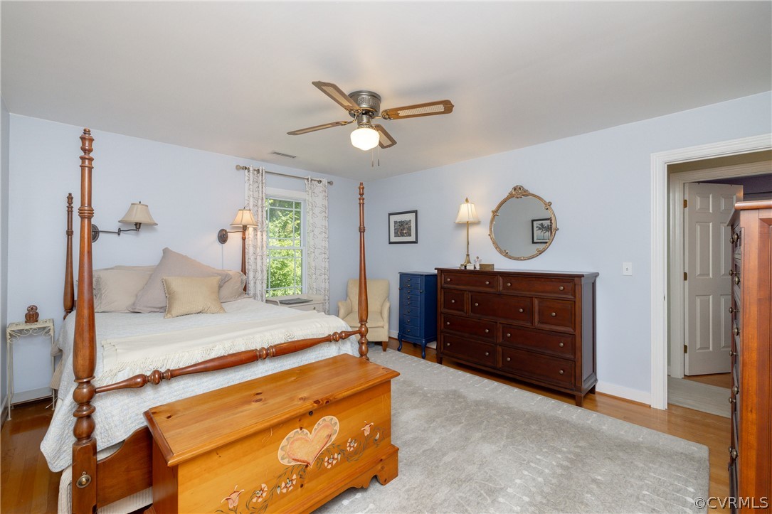 5421 Hunters Trail Road Goochland, VA 23063 - Photo 26 of 50 a bedroom with a bed and a dresser