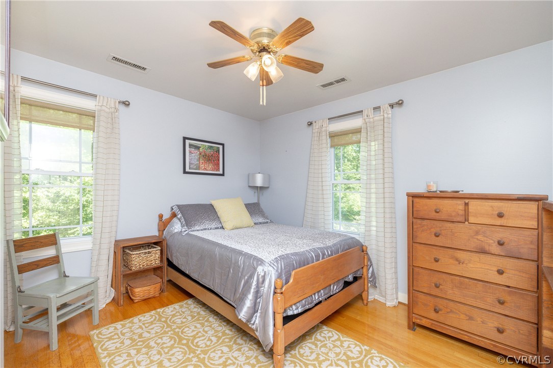 5421 Hunters Trail Road Goochland, VA 23063 - Photo 31 of 50 a bedroom with a bed and window