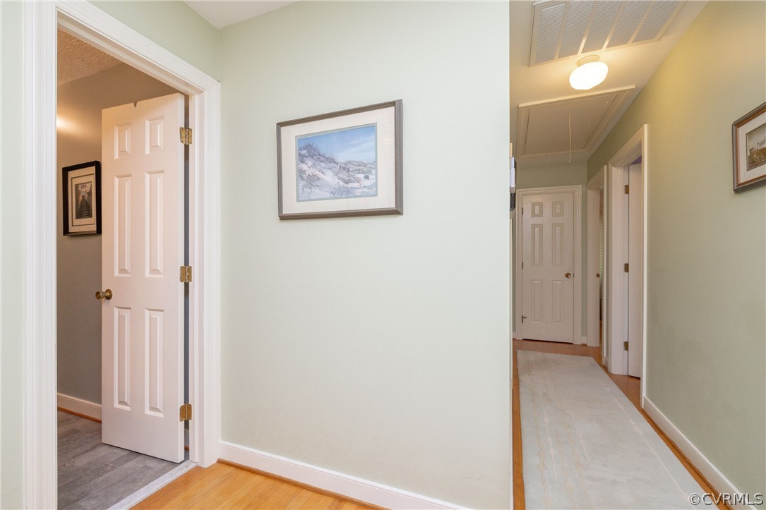 5421 Hunters Trail Road Goochland, VA 23063 - Photo 36 of 50 a view of a hallway with wooden floor