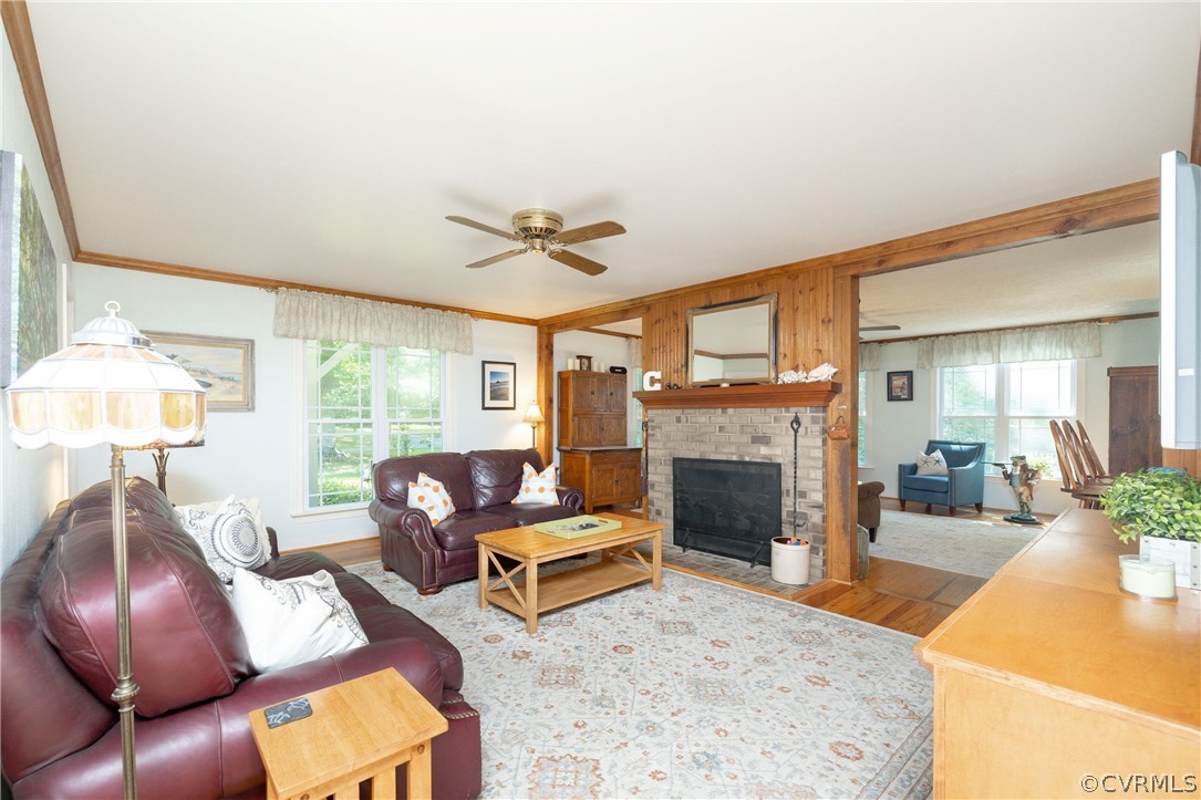 5421 Hunters Trail Road Goochland, VA 23063 - Photo 10 of 50 a living room with furniture and a fireplace