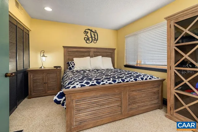 a view of a room with stairs and furniture