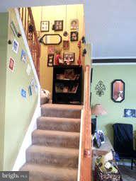 881 Middle River Road Baltimore, MD 21220 - Photo 2 of 3 a view of entryway with furniture and rug