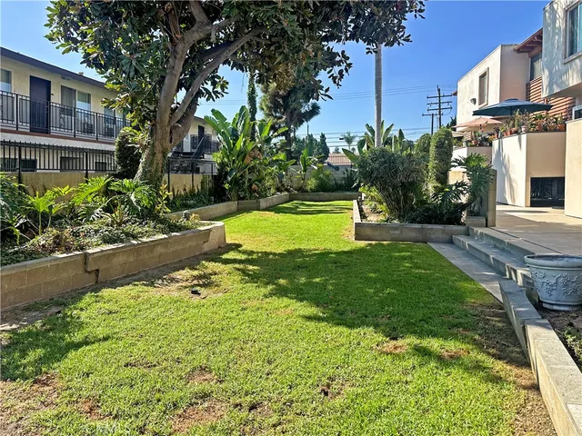 a view of a swimming pool with a garden