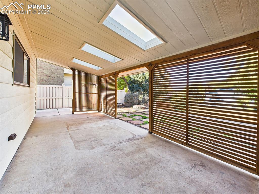 5040 Escapardo Way Colorado Springs, CO 80917 - Photo 39 of 50 a view of a porch with wooden floor