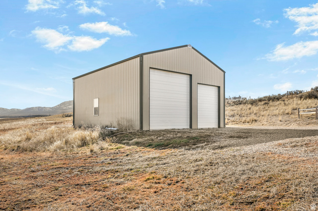 18573 South Marsh Valley Road Downey, ID 83234 - Photo 23 of 32 Detached garage with a mountain view