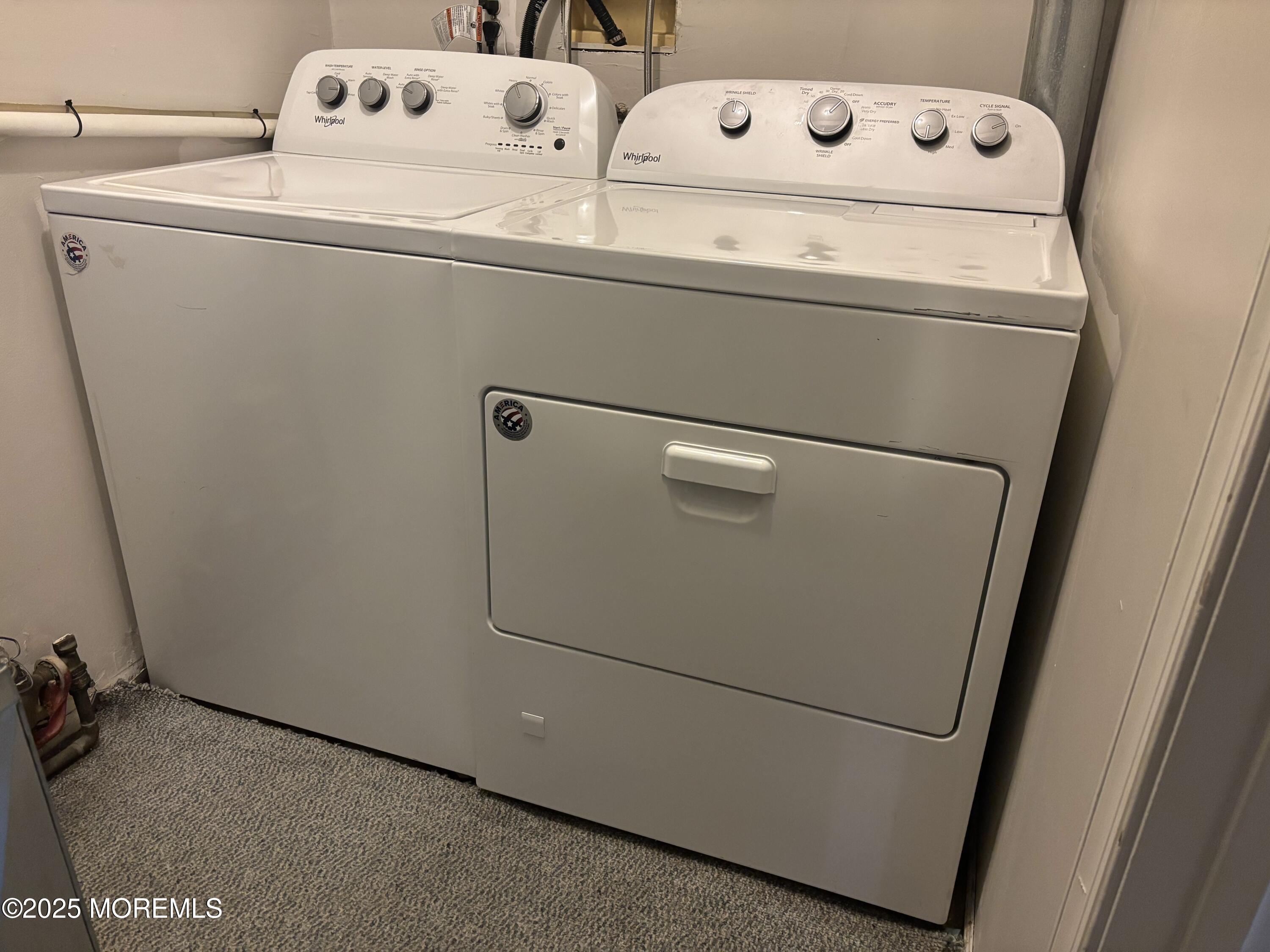 481 Hawthorne Place Morganville, NJ 07751 - Photo 33 of 36 a utility room with dryer and washer