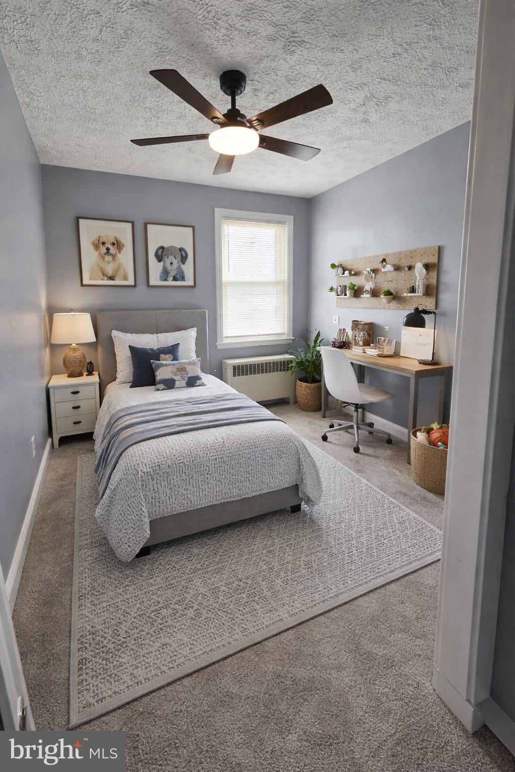 6105 Frederick Road Catonsville, MD 21228 - Photo 23 of 38 a bedroom with a bed and wooden floor