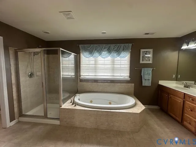 a view of a livingroom with a window and furniture