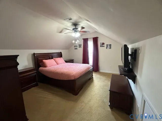 a view of a house with backyard and porch